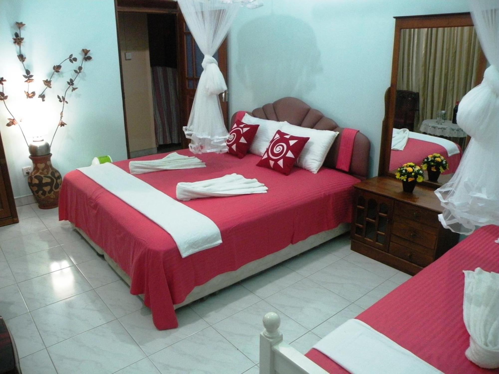 Henderson Airport Residence Negombo Bilik gambar