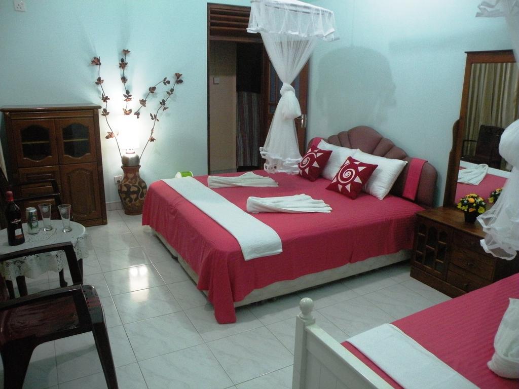 Henderson Airport Residence Negombo Bilik gambar